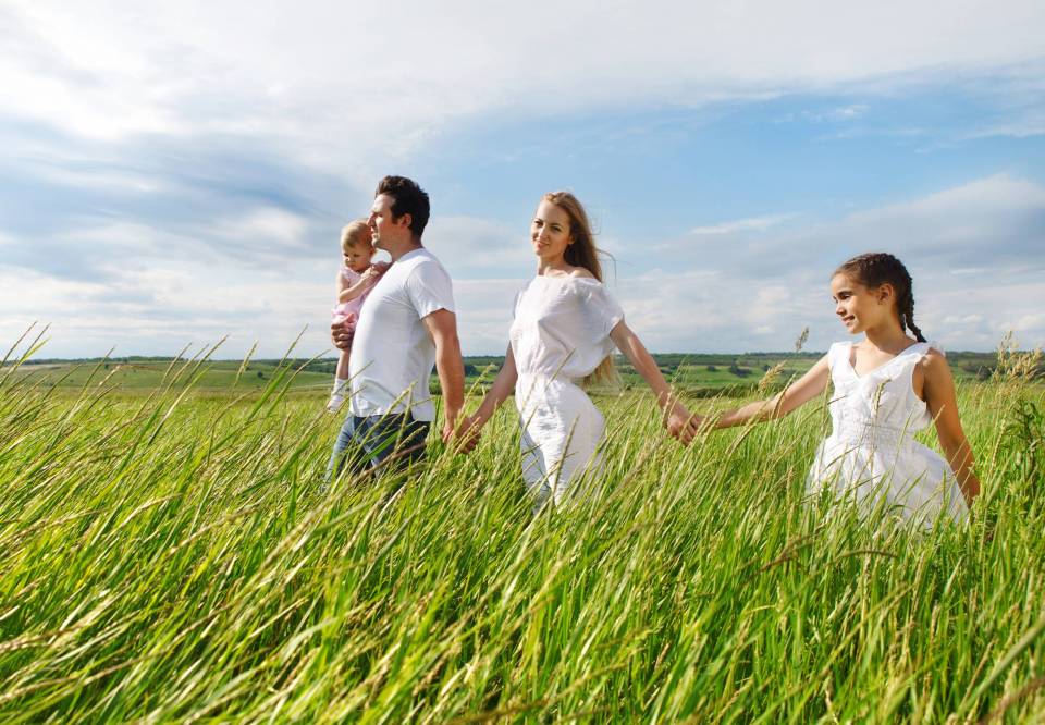 happy-young-family-outdoors-2025-01-10-02-14-21-utc